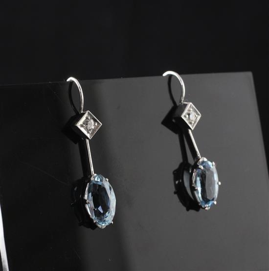 A pair of white gold, aquamarine and diamond drop earrings, approx. 1.25in.